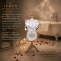 Le Bain white rhinestone crown pet spa robe on mannequin in candlelit marble bathroom with rose petals luxury dog cat robe