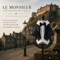 Le Monsieur tuxedo outfit, featuring a black and white plaid cape jacket, white shirt, and black bow tie for dogs
