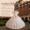 Southern Belle a Victorian luxury dog wedding gown with tulle skirt in front of Hotel Roanoke in Roanoke, Virginia.