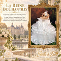 La Reine De Chantilly luxury dog wedding gown featuring cascading ivory lace, jeweled flourishes, and sweeping tulle layers.