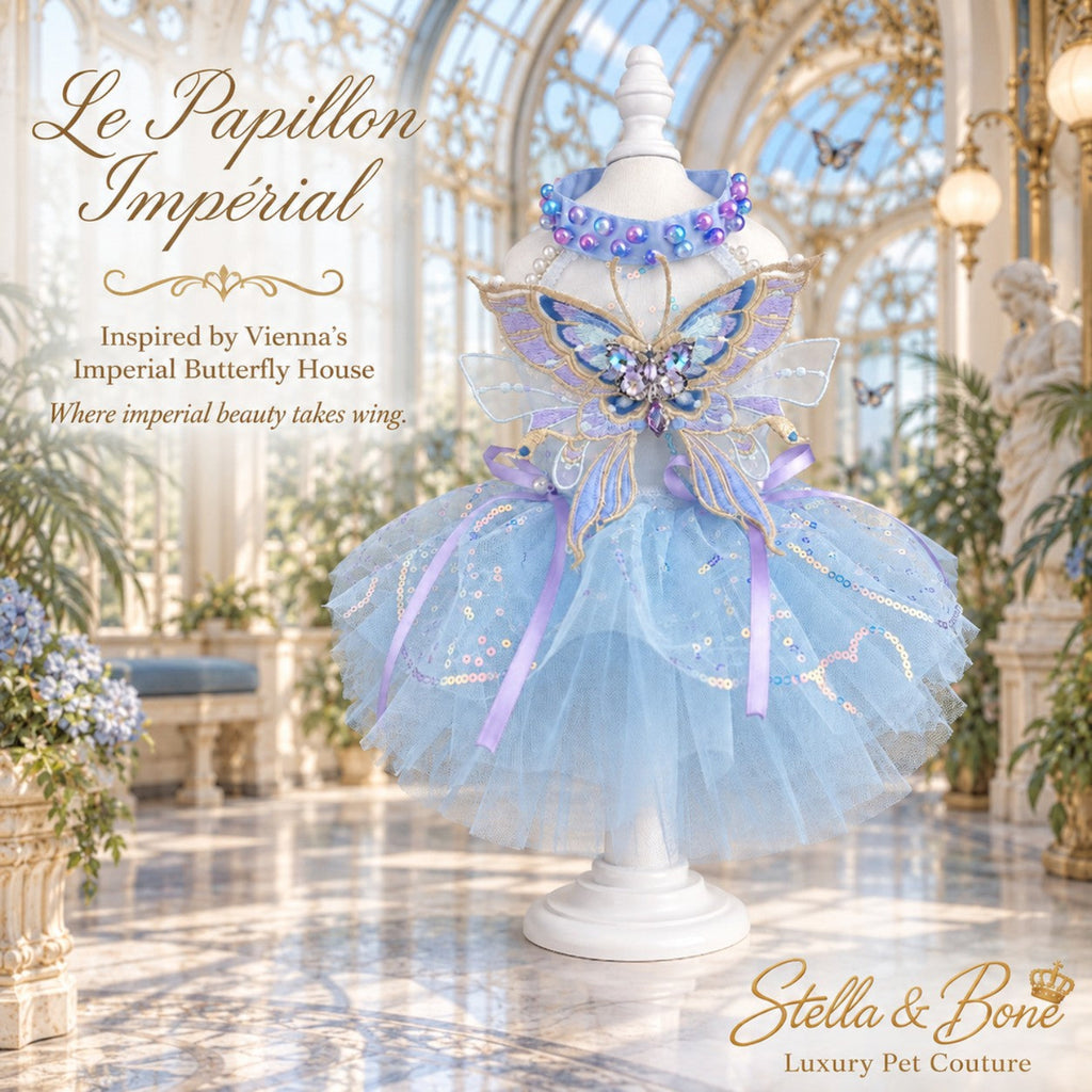 Le Papillon Imperial blue tulle dog couture wedding dress with embroidered butterfly wings and a pearl collar on mannequin