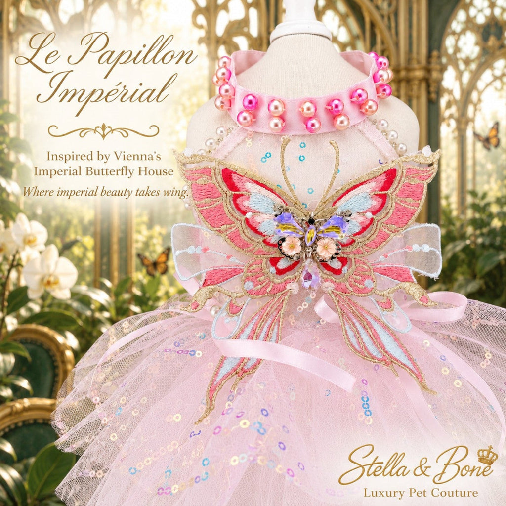 Close up detail of Le Papillon Imperial pink dog birthday dress with embroidered butterfly wings and pearl collar on mannequin