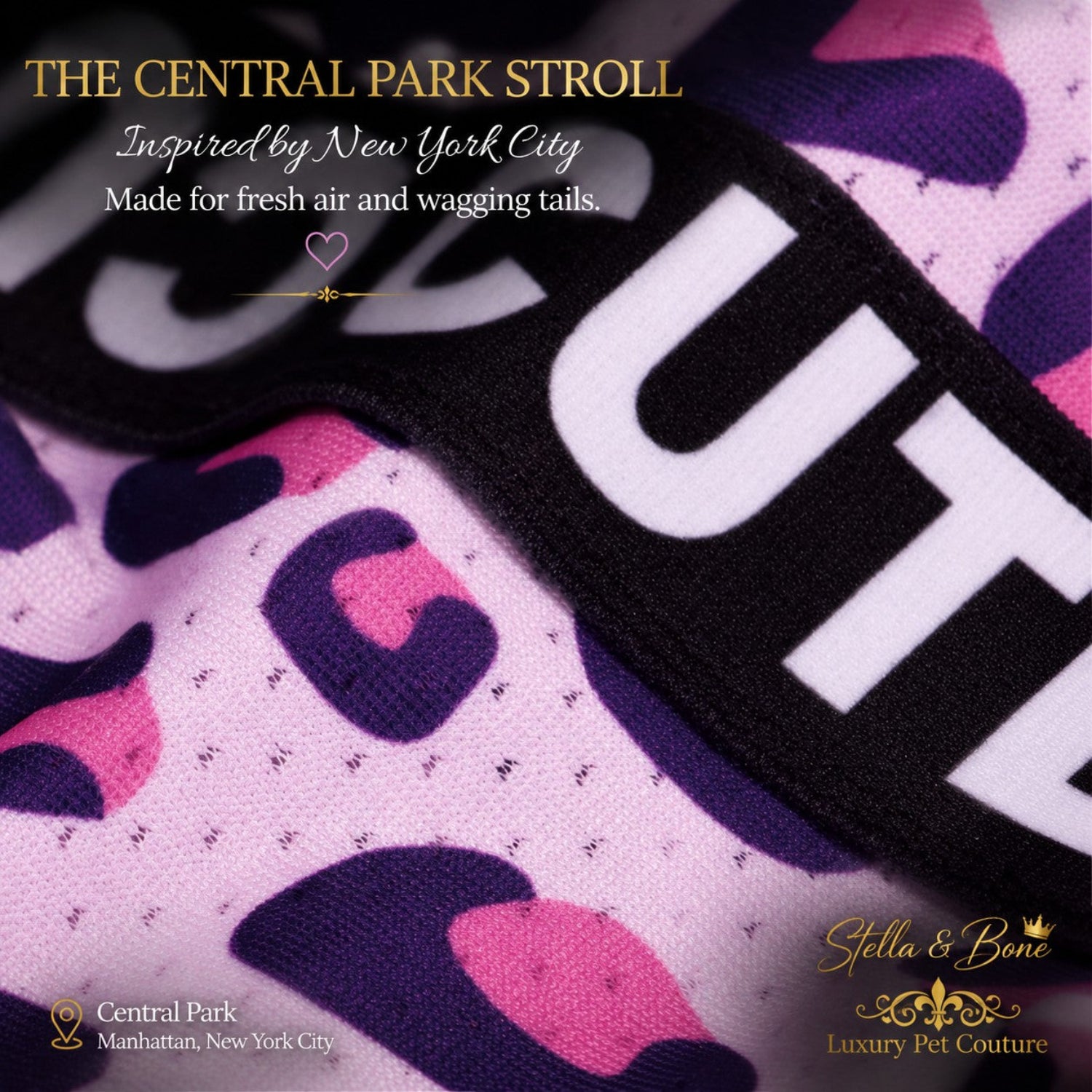 The Central Park Stroll luxury dog dress in pink leopard print worn by a French Bulldog on a New York sidewalk with bow.