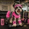 The Fifth Avenue Fit luxury dog dress in hot pink mesh with a matching headband and wristbands inside a high-end gym.